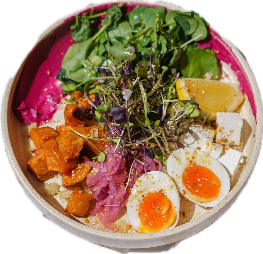 Nourish bowl with beetroot hummus, sweet potato, greens and boiled eggs
